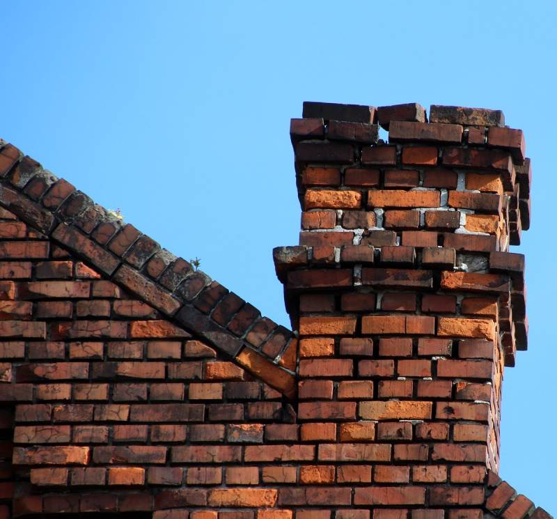 Signs Your Severna Park Home Needs a Chimney Inspection Damaged chimney on an Severna Park home showing cracks and missing mortar